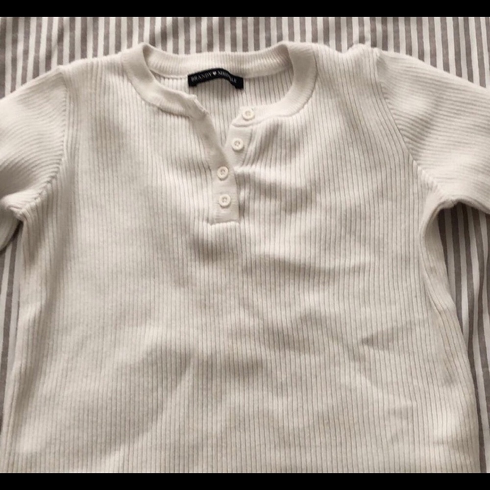 white brandy sweater